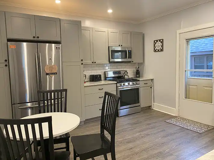 Fully equipped kitchen! Supplied with all of the basics and more! Dishwasher, stove, 2 types of coffee machines, countertop ice maker, microwave, air fryer, etc. We also include a tucked away rolling kitchen island for extra meal prep space!